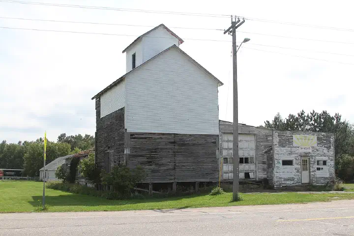A grain elevator on East Third Avenue in Hewitt, Minnesota.