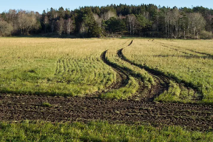 Tractor tracks in a field at Heden in Gåseberg, Lysekil Municipality, Sweden.