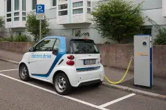 An EnBW charging station in Stuttgart with a Car2Go Smart electric car.