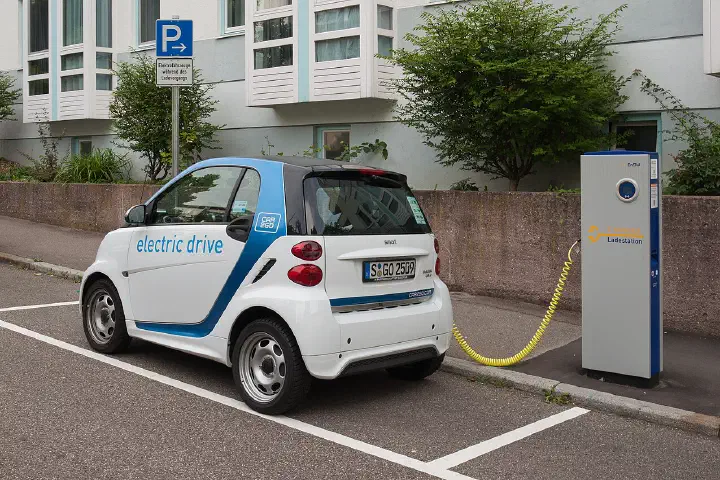 An EnBW charging station in Stuttgart with a Car2Go Smart electric car.