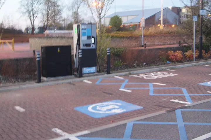 An electric car charging point at the Cluster of Nuts car park in Wetherby, West Yorkshire.