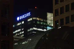 Looking across the City Canal towardsthe Barclays building at night