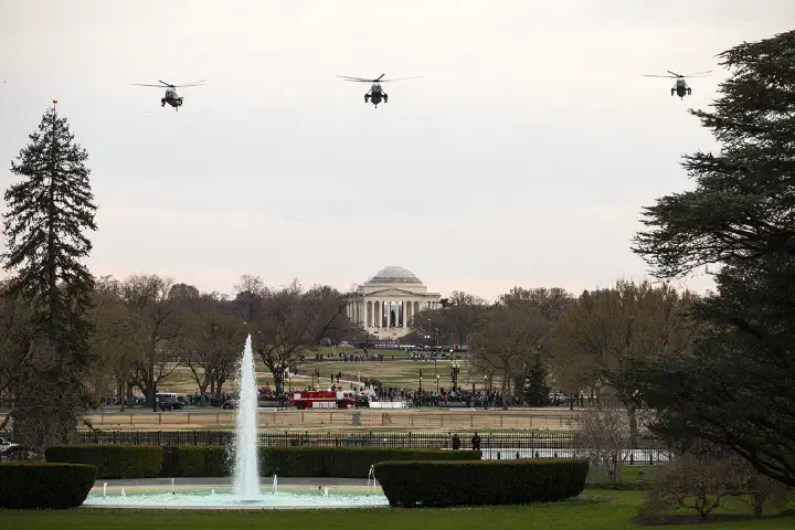 Marine One, carrying President Donald J. Trump and accompanied by escort helicopters, approaches for a landing Sunday evening, March 24, 2019.