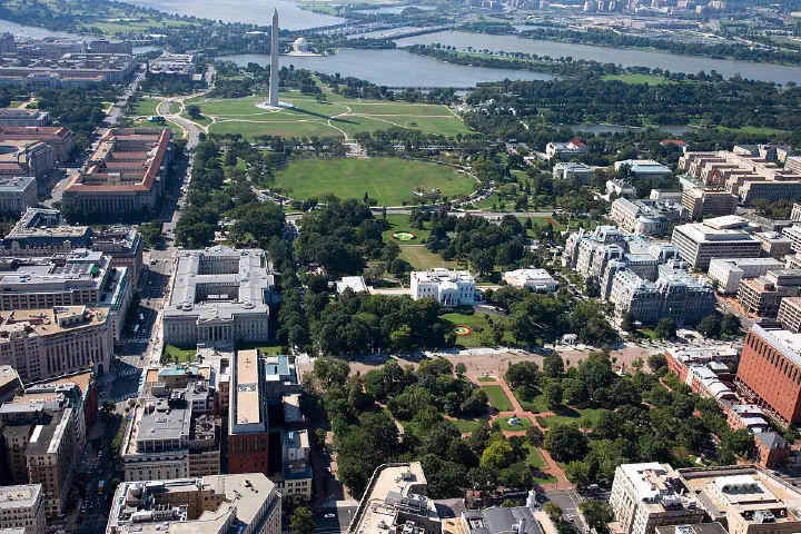 An aerial view of President's Park in Washington, D.C., with Lafayette Square in the foreground, the White House and the Ellipse.