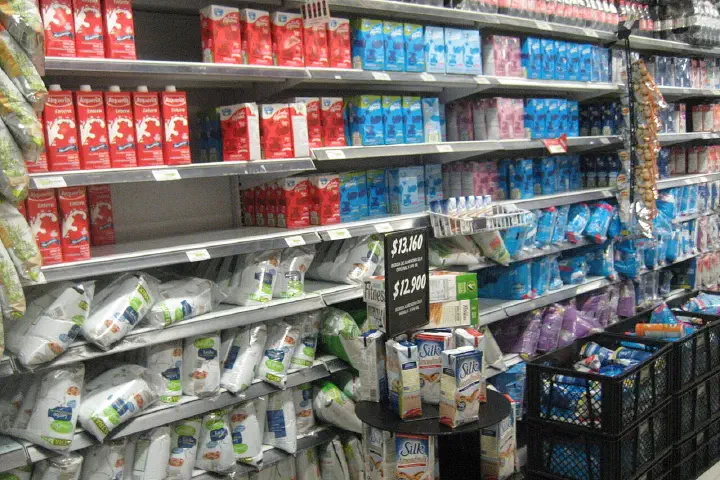 Milk on unrefrigerated shelves in a grocery store in Cartagena, Colombia.