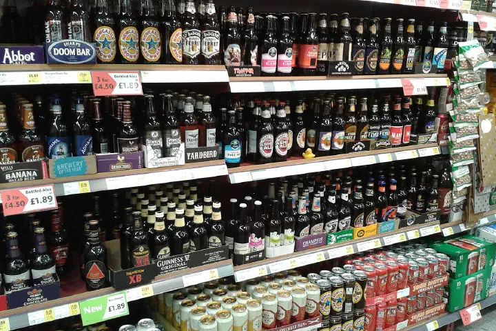 Shelves of beer at a Morrisons supermarket on October 2, 2013.
