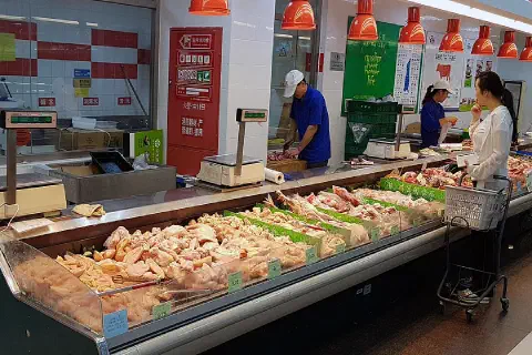 The meat counter at the Dinkelong supermarket in Tuanjiehu, Beijing.