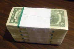 1000 United States two-dollar bills in shrink wrap