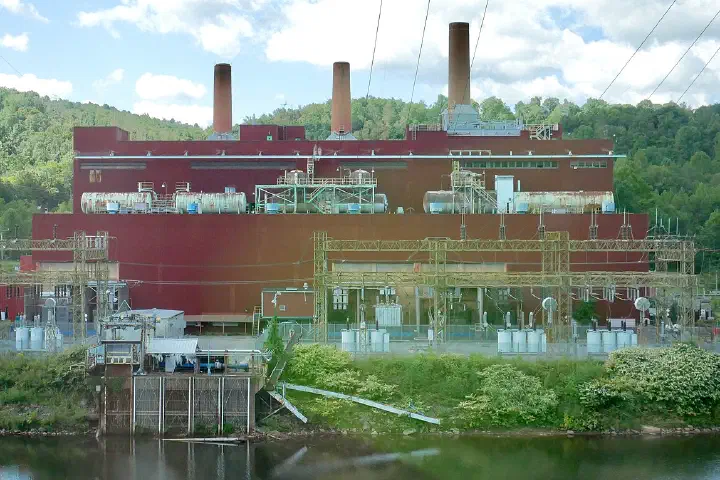 The Albright Power Station, retired in 2012, seen across the Cheat River in Albright, West Virginia.