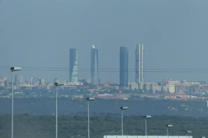 The Cuatro Torres Business Area in Madrid, seen from a car.