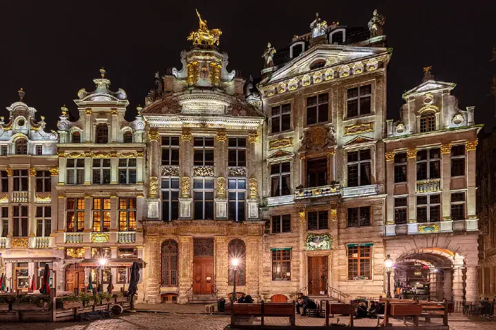Buildings on the Grand-Place, the central square of Brussels, at night.