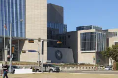 The Federal Reserve Bank Building in Dallas, seen from Klyde Warren Park.