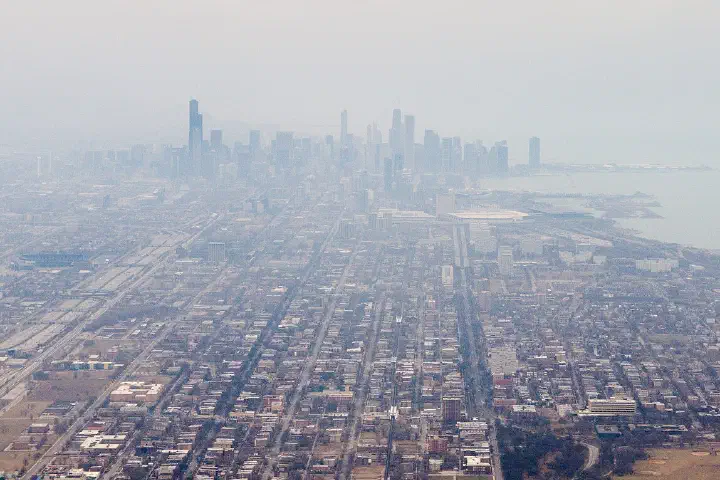 An aerial view of downtown Chicago and Lake Michigan.