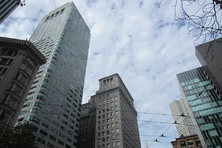 Looking up at the Financial District skyline from Market, Sansome and Sutter streets in San Francisco, 2018.