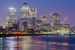 Canary Wharf seen from the Thames Path at Limehouse, London.