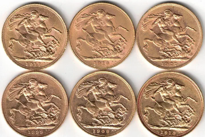 Gold sovereign coins.