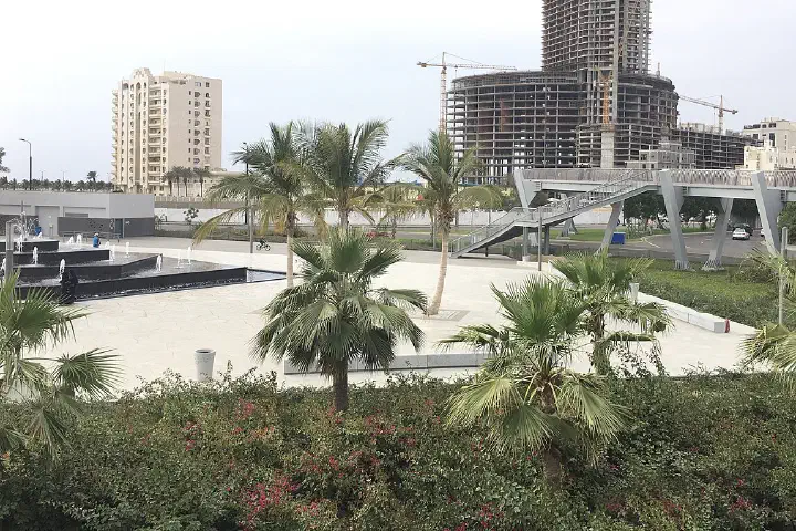 The unfinished Lamar Towers with newly constructed parks.