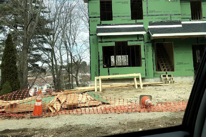 Framing and sheathing underway on new construction on Gayland Road.