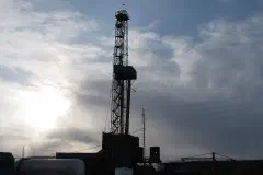 The Kordinskaya oil exploration drilling rig in Evenkiysky District in the evening.