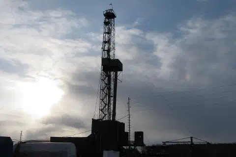 The Kordinskaya oil exploration drilling rig in Evenkiysky District in the evening.
