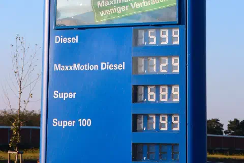 OMV petrol station sign with 2012 gas prices at a highway rest stop in Austria