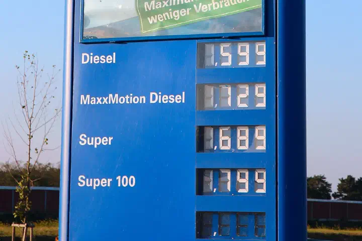 OMV petrol station sign with 2012 gas prices at a highway rest stop in Austria