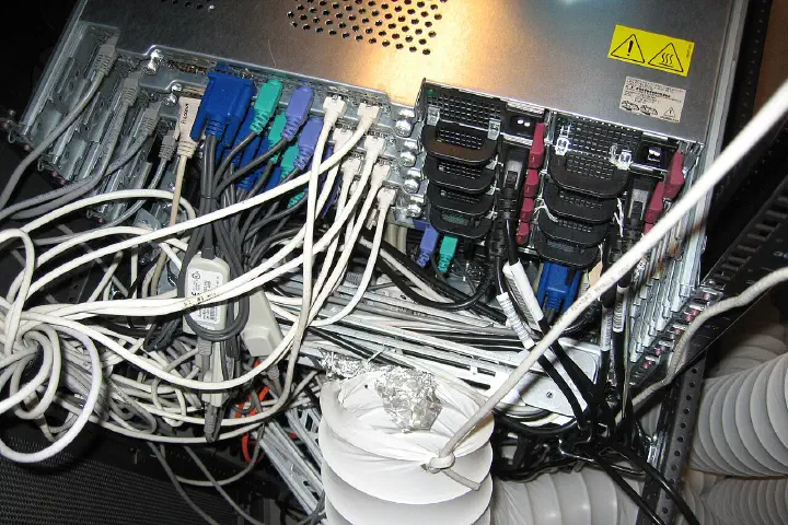 Server racks in a DHL Netherlands local site computer room.