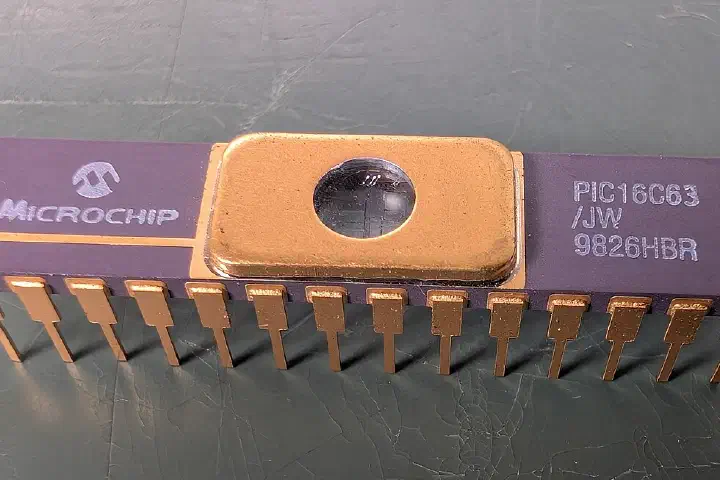 A Microchip Technology PIC16C63 microcontroller in a ceramic package.