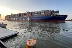 The CMA CGM Marco Polo in the Port of Savannah, Georgia, with the Talmadge Memorial Bridge in the background.