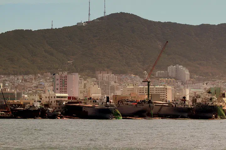 Ship repairers at the Port of Busan, South Korea, October 2012.
