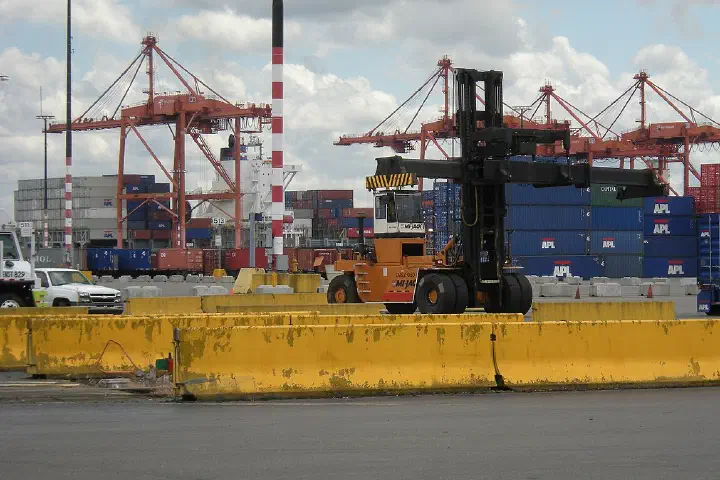 A Mi-Jack MJ450 crane for loading containers onto trucks.