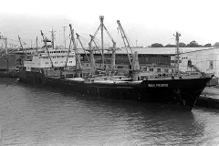 A starboard bow view of the Soviet cargo ship Nbah Pycakob in port during exercise Unitas XX