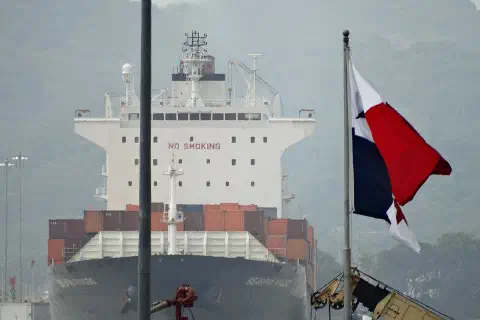 A container ship enters the Miraflores Locks on the Panama Canal.