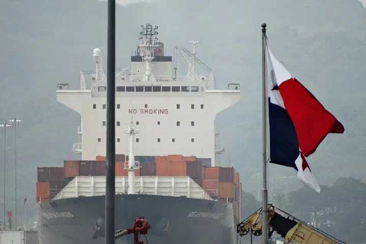 A container ship enters the Miraflores Locks on the Panama Canal.