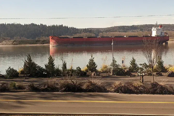 A bulk carrier anchored in the Columbia River.