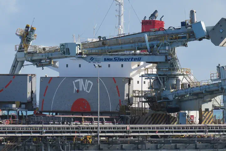 The Bulk carrier Crimson Princess and ship loader at Kwinana Bulk Jetty, Western Australia