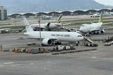 A CMA CGM Air Cargo Boeing 777F at Hong Kong airport.