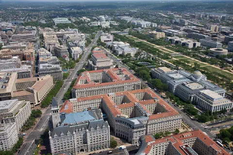 An aerial view of Pennsylvania Avenue (left) and the Federal Triangle (center), facing east toward the U.S. Capitol in Washington.