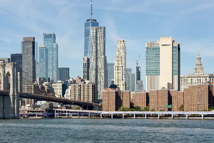 Brooklyn Bridge and Lower Manhattan seen from NYC Ferry on the East River, New York City